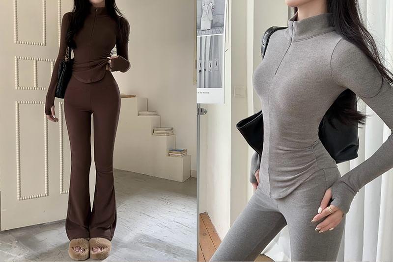 Set: Long-Sleeve Stand Collar Plain Half Zip Top + High Waist Plain Flared Pants Product Image