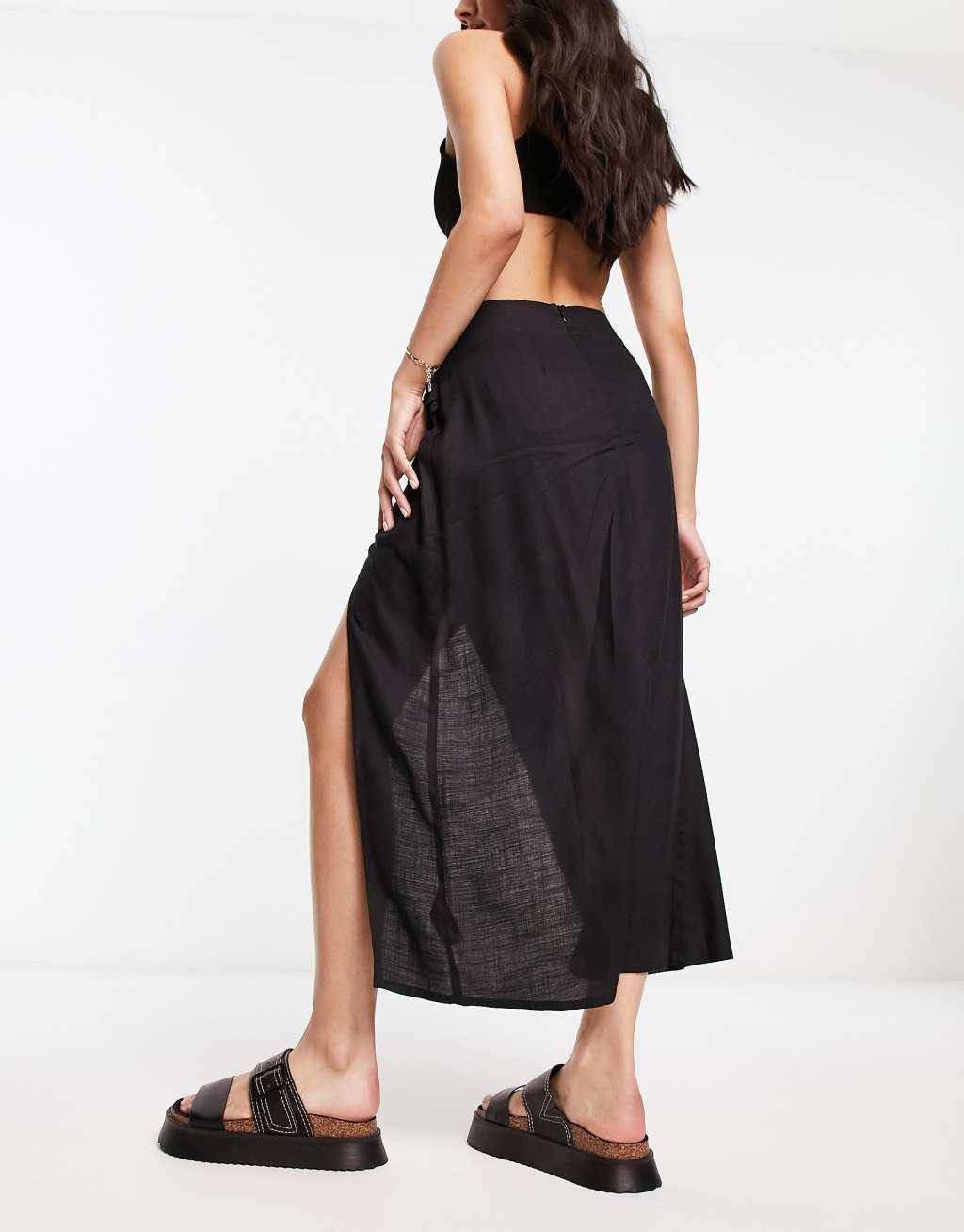 ASOS DESIGN natural slub ruched side midi skirt in black Product Image