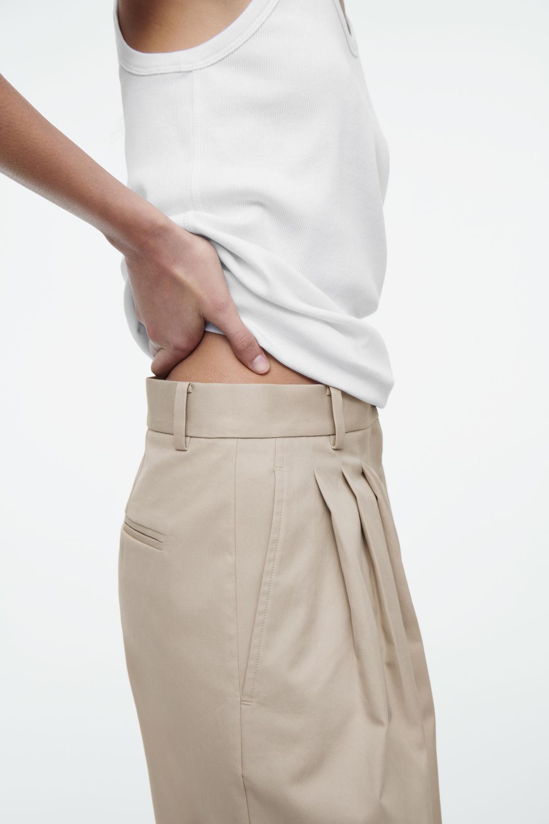 PLEATED BARREL-LEG COTTON TROUSERS product image