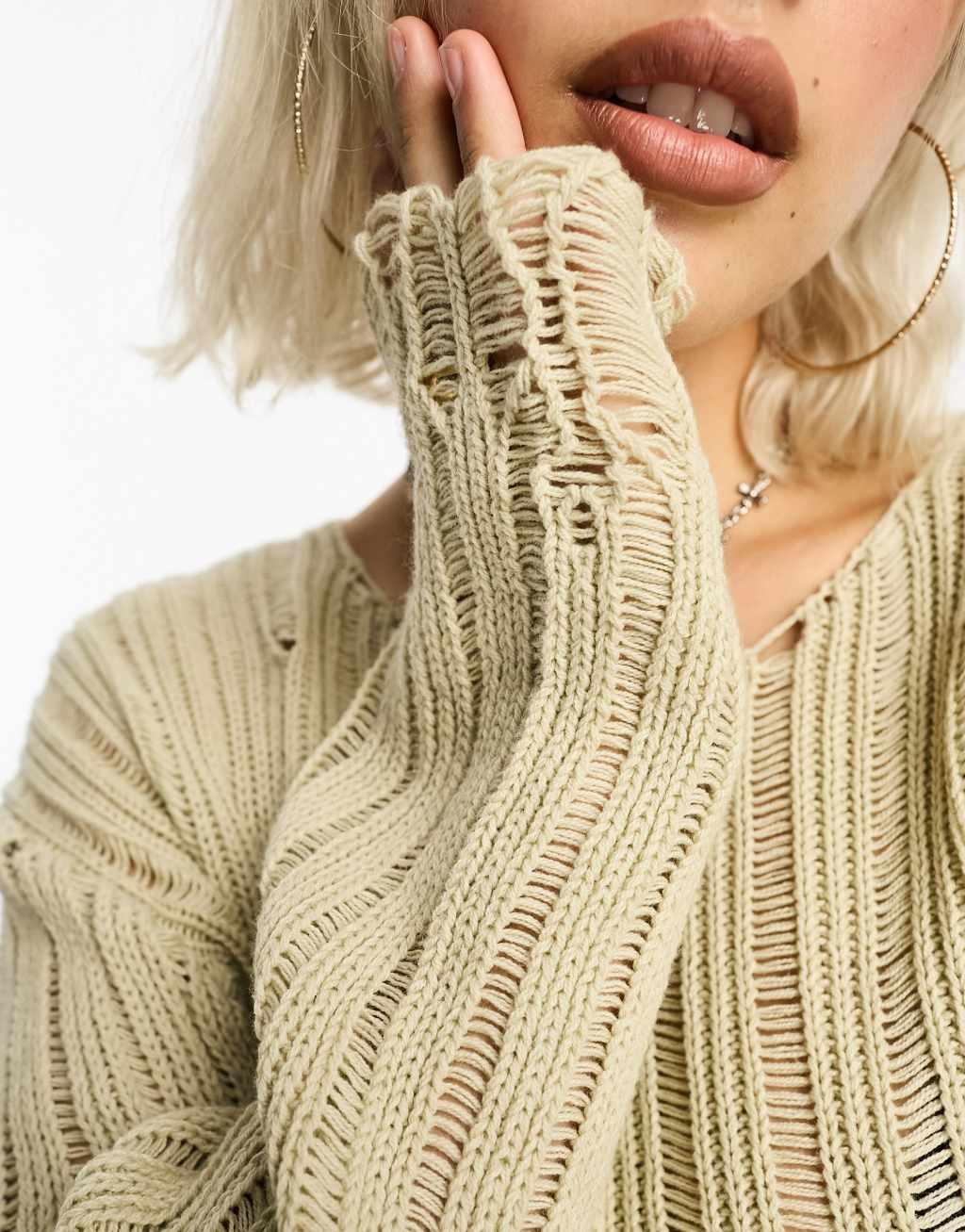 COLLUSION cropped distressed nibbled hem sweater in stone Product Image