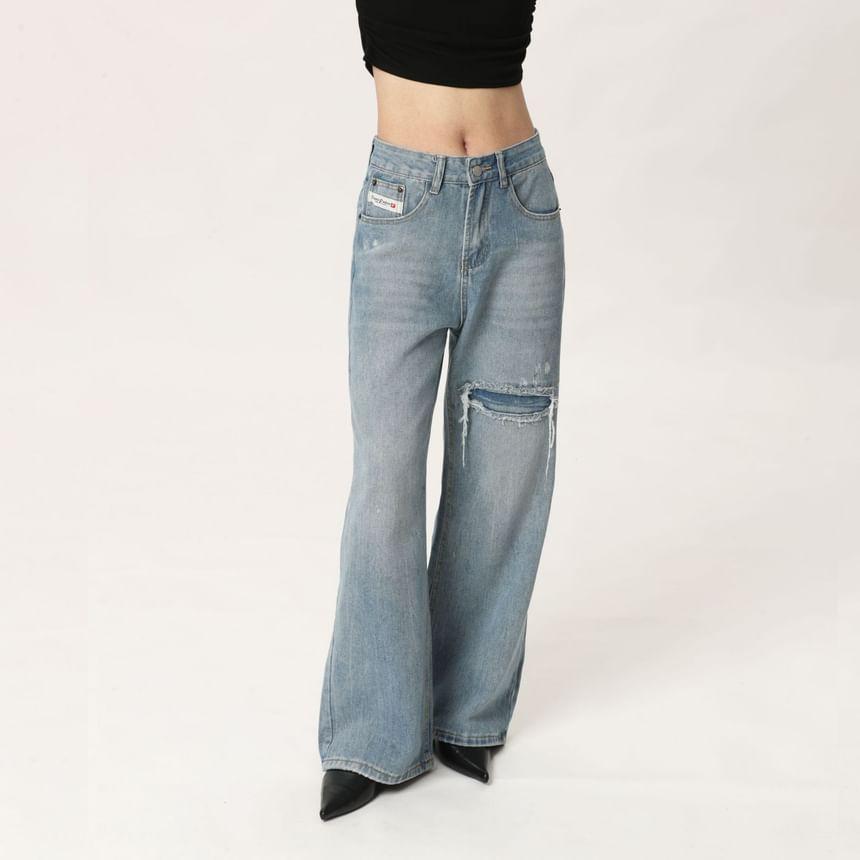 Mid Rise Washed Ripped Wide Leg Jeans product image