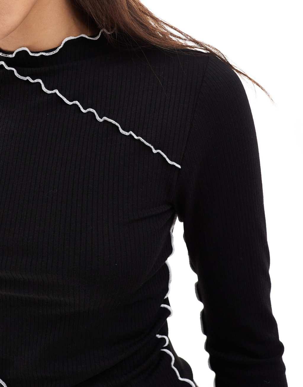 Pieces long sleeve top with contrast lettuce edge detail in black Product Image