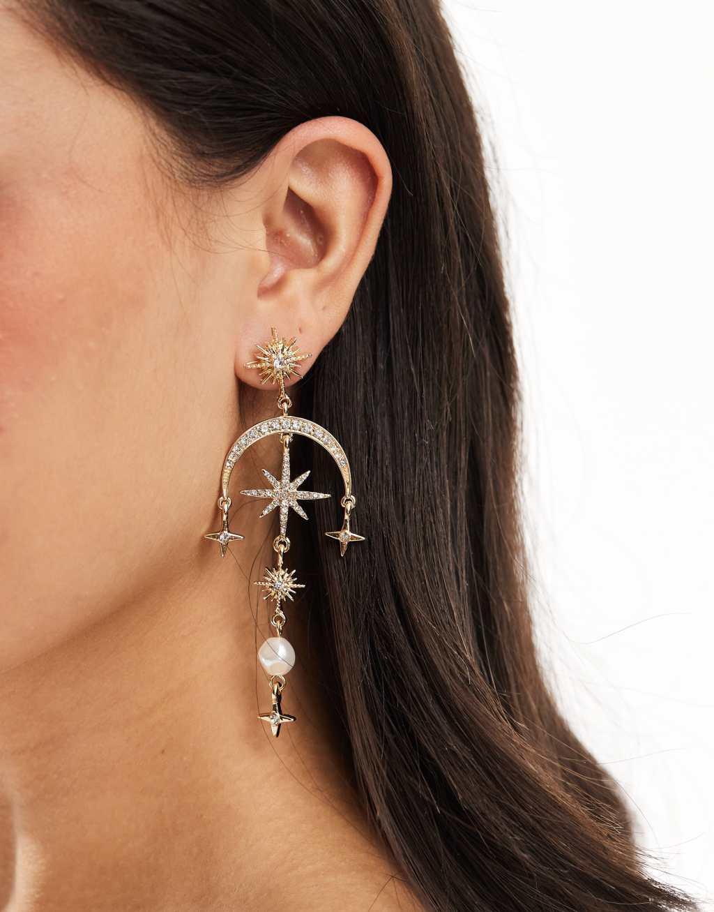 ASOS DESIGN drop earrings with celestial crystal and faux pearl detail in gold tone Product Image