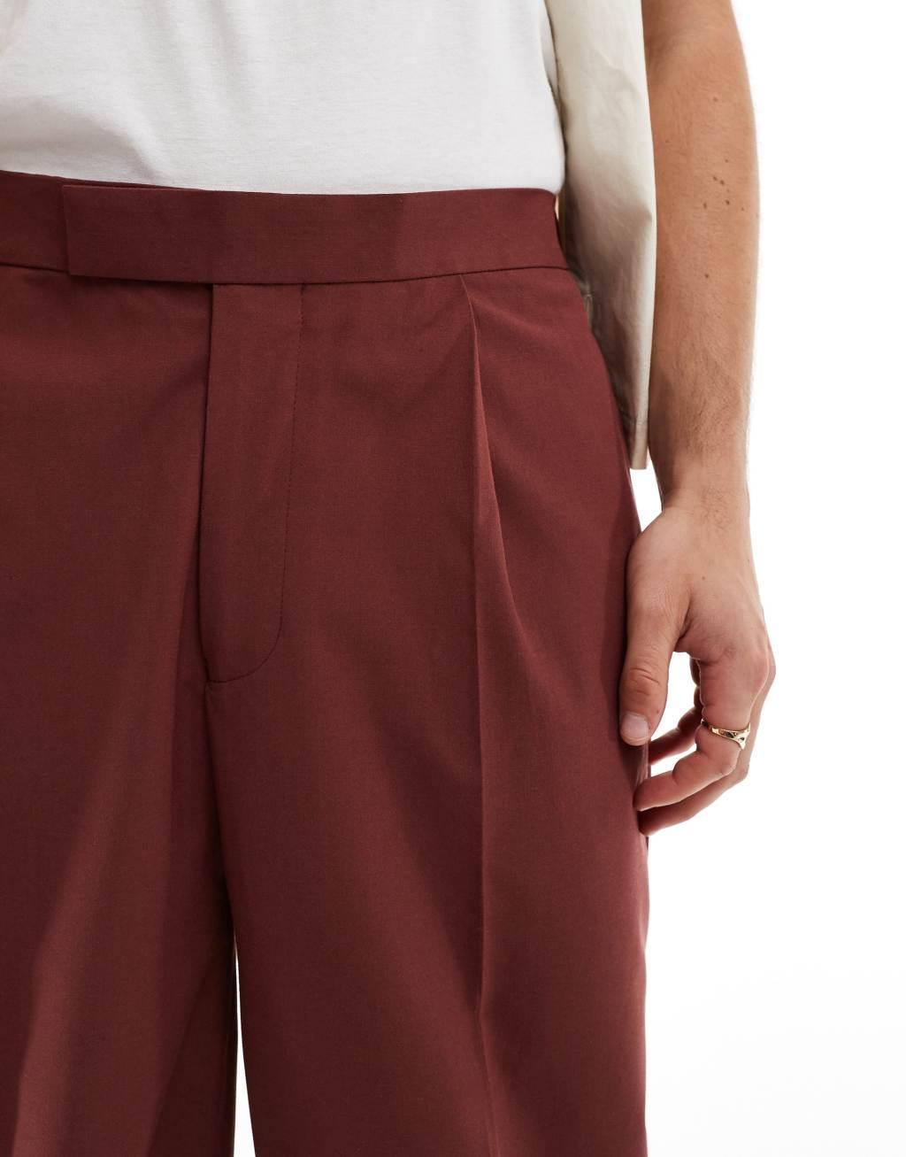 ASOS DESIGN pull on smart oversized tapered pants in burgundy Product Image