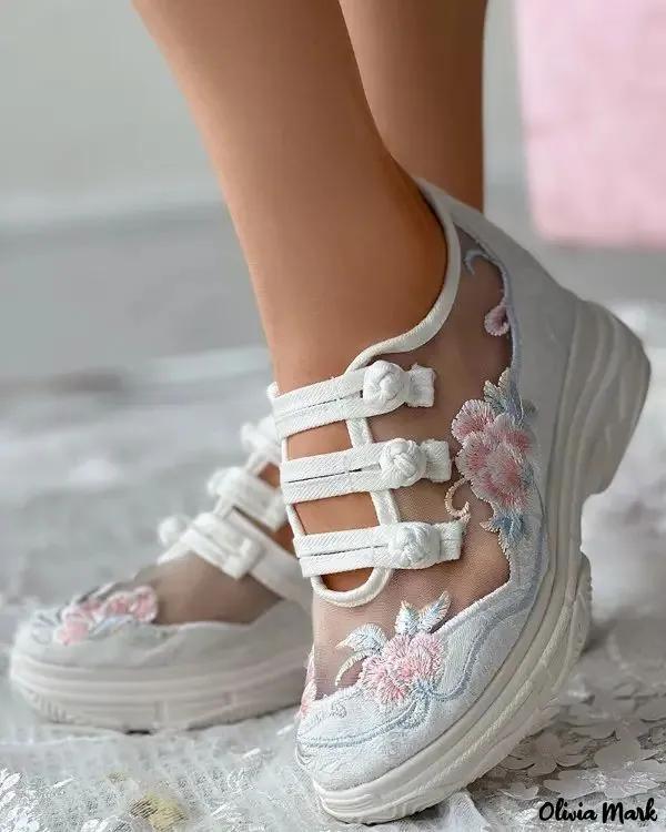 Olivia Mark – Sneakers with cut-outs and floral embroidery in transparent mesh Product Image